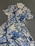 Spring and summer new catwalk printed short-sleeved shirt skirt with high waist and large swing waist and single-breasted dress.