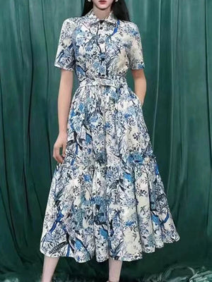 Spring and summer new catwalk printed short-sleeved shirt skirt with high waist and large swing waist and single-breasted dress.